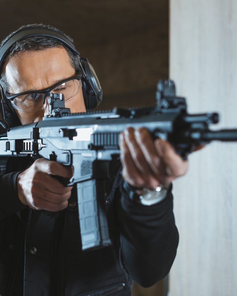 Man shooting AR